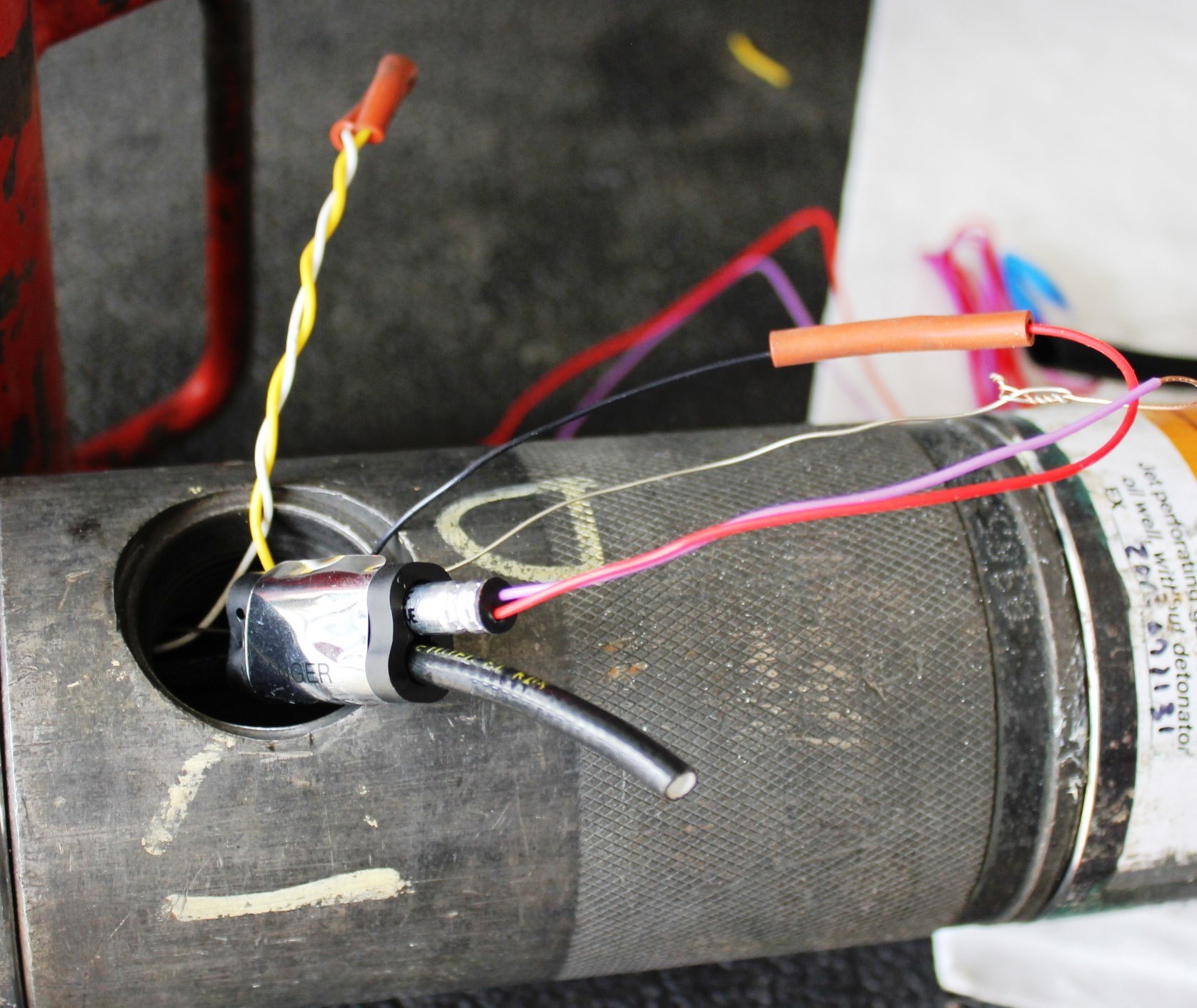 10-slide-det-onto-primacord-and-make-sure-all-wires-are-in-place 10-slide-det-onto-primacord-and-make-sure-all-wires-are-in-place